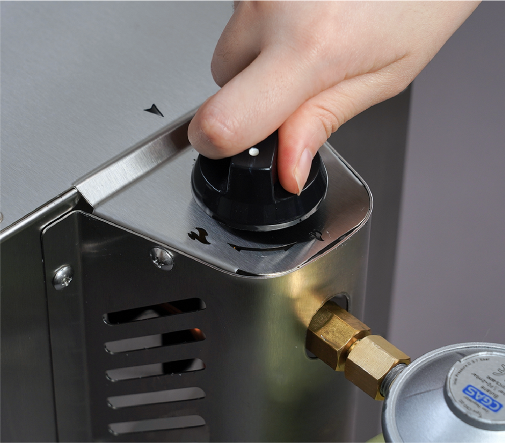 Press and rotate the button to power on